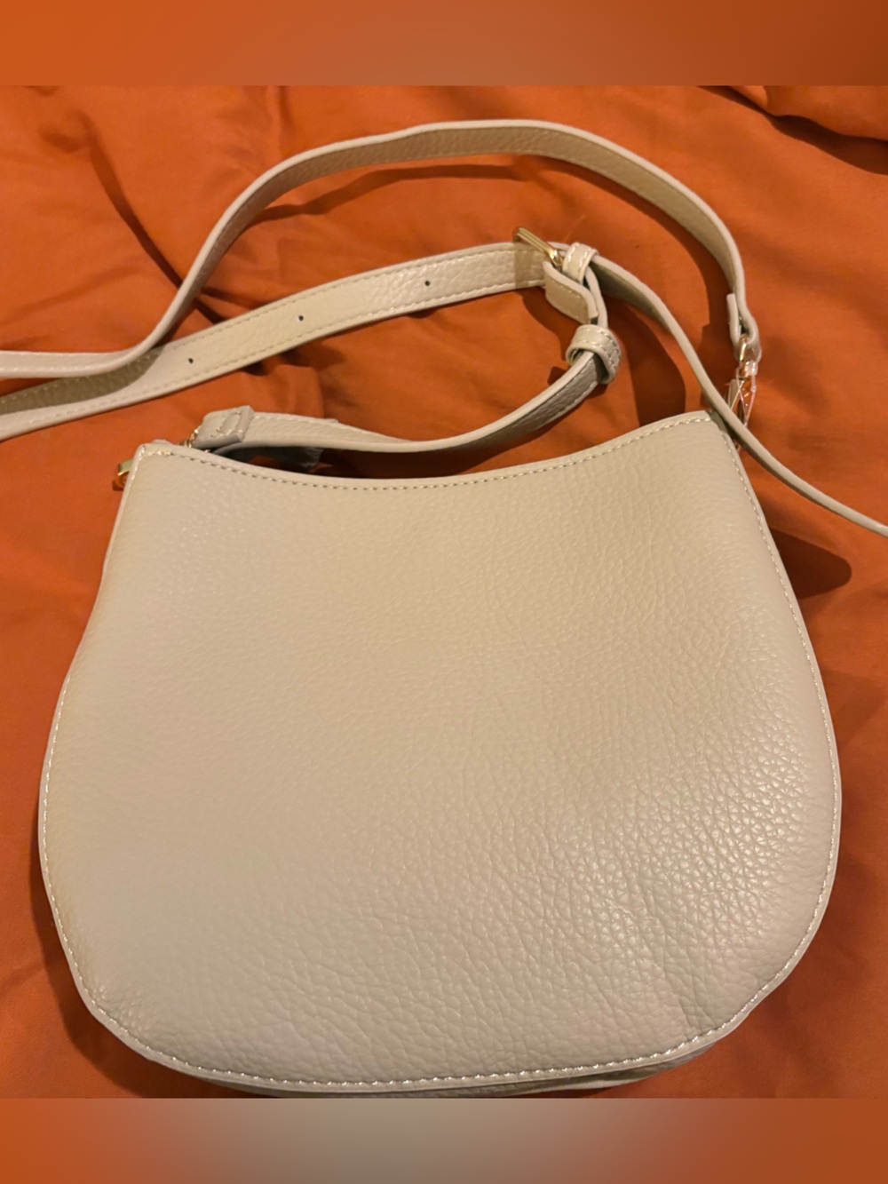 Moda Luxe Cream Pebbled Leather Saddle Crossbody